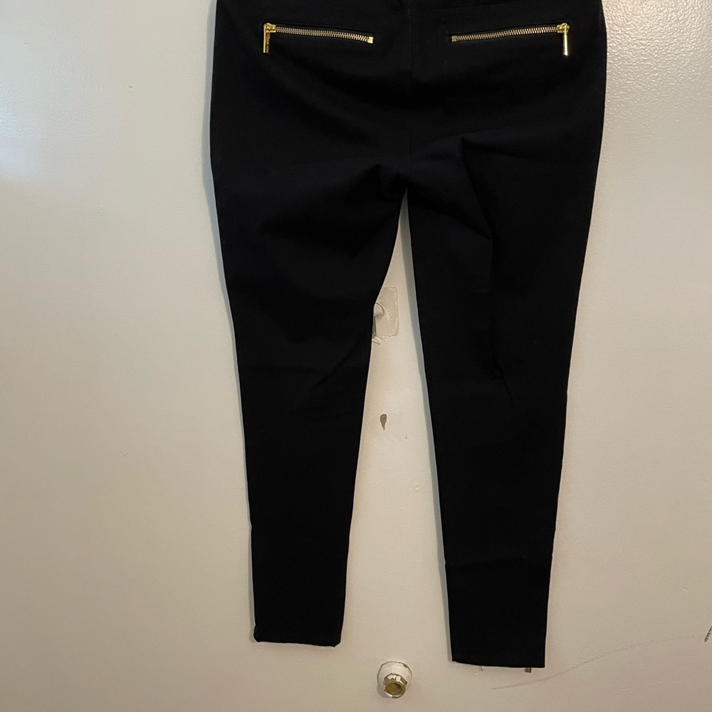 Michael Kors, size 8 black pants. Used good condition.Gold zipper and buttons - Picture 3 of 6